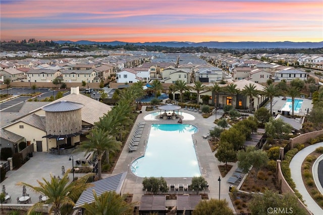 32182 Penstemon Way, Temecula, CA 92591 - aerial view at dusk of view of pool area, a residential view, and a mountain view