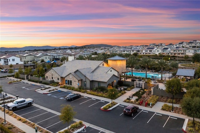 32182 Penstemon Way, Temecula, CA 92591 - aerial view at dusk of a residential view, view of pool area, and a mountain view