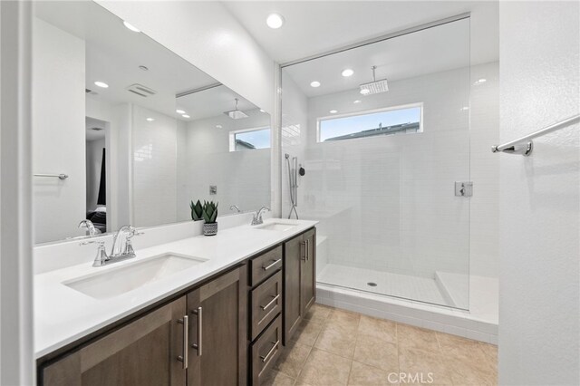 32182 Penstemon Way, Temecula, CA 92591 - bathroom featuring double vanity, a stall shower, tile patterned flooring, and recessed lighting