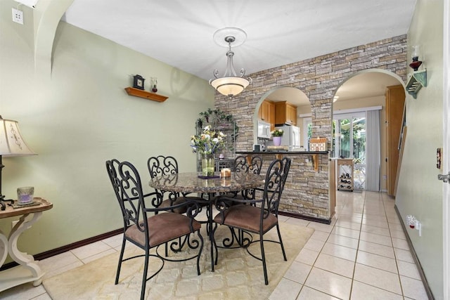 10158 Carefree Dr, Santee, CA 92071 - dining room with arched walkways, light tile patterned flooring, and baseboards