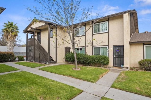 10158 Carefree Dr, Santee, CA 92071 - view of front of property featuring stucco siding, a front yard, and stairway