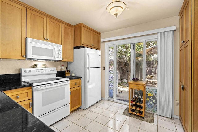 10158 Carefree Dr, Santee, CA 92071 - kitchen with white appliances, light tile patterned floors, and dark stone counters