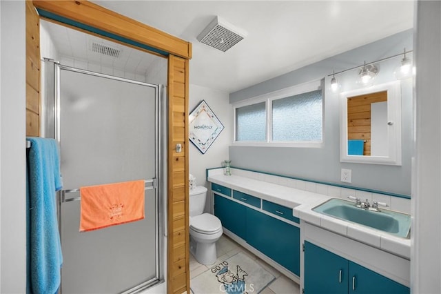 1005 E Woodland Ln, Glendora, CA 91741 - full bath with toilet, vanity, a shower stall, and tile patterned floors