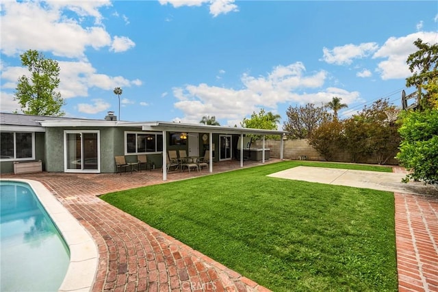 1005 E Woodland Ln, Glendora, CA 91741 - rear view of property featuring a patio area and stucco siding