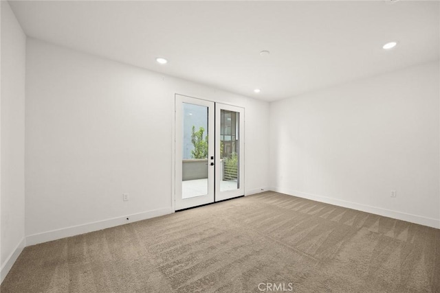 16321 Dawn Way Unit 108, Tustin, CA 92782 - carpeted spare room featuring baseboards, recessed lighting, and french doors