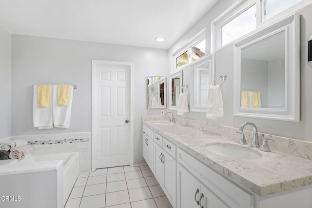 11998 Bubbling Brook St, Moorpark, CA 93021 - full bathroom with tile patterned floors, double vanity, and a bath