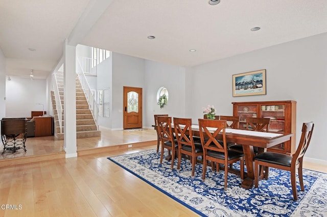 11998 Bubbling Brook St, Moorpark, CA 93021 - dining room featuring stairs, light wood finished floors, baseboards, and recessed lighting
