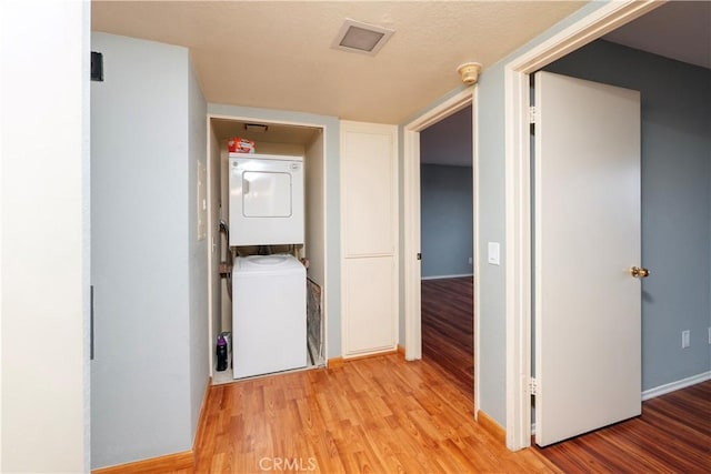 776 E San Bernardino Rd Unit 3, Covina, CA 91723 - corridor featuring estacked washer and dryer and light wood-type flooring
