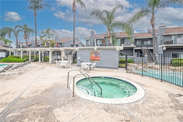 776 E San Bernardino Rd Unit 3, Covina, CA 91723 - view of pool featuring a residential view, fence, a pergola, a hot tub, and a patio