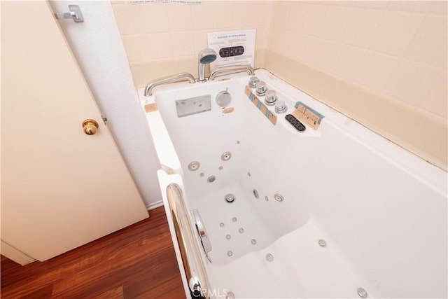 776 E San Bernardino Rd Unit 3, Covina, CA 91723 - bathroom view of wood finished floors and a tub with jets