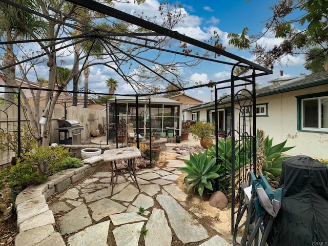 9884 Settle Rd, Santee, CA 92071 - view of patio / terrace featuring fence, a fire pit, and a grill