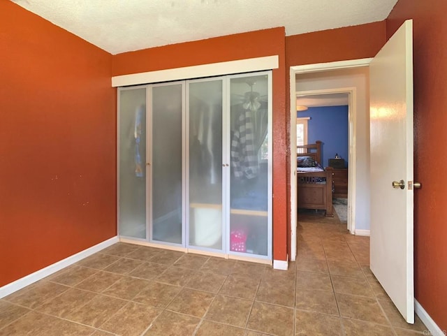 9884 Settle Rd, Santee, CA 92071 - empty room with baseboards and tile patterned flooring