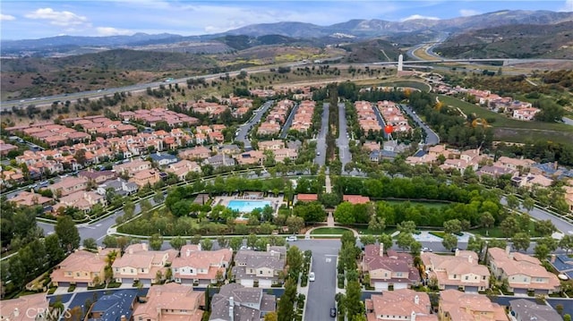38 Upperbend, Irvine, CA 92618 - aerial view of property's location featuring nearby suburban area and a mountainous background