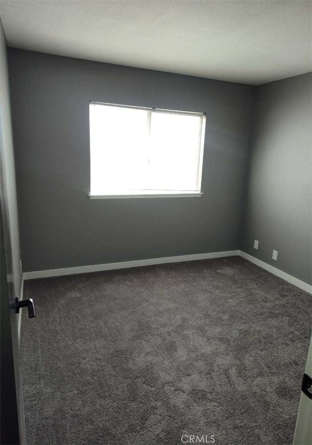 26702 Via Linares, Mission Viejo, CA 92691 - carpeted empty room featuring baseboards