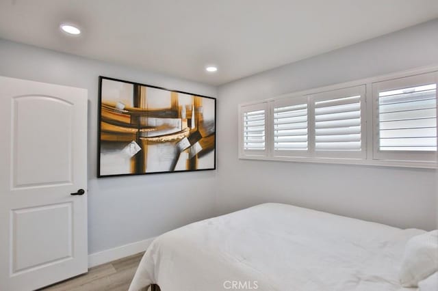 15132 Kornblum Ave, Lawndale, CA 90260 - bedroom featuring light wood-style floors, baseboards, and recessed lighting
