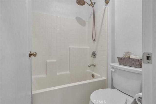 full bathroom with toilet and  shower combination