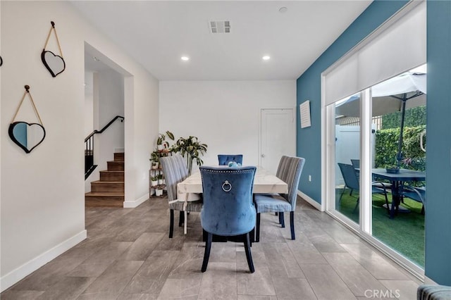 dining area featuring stairway, recessed lighting, and baseboards