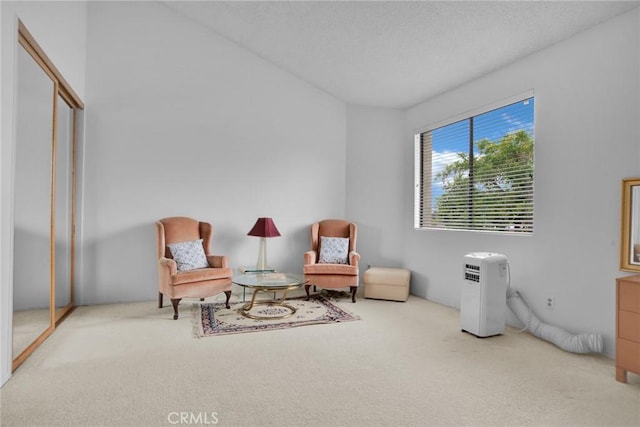 living area with carpet