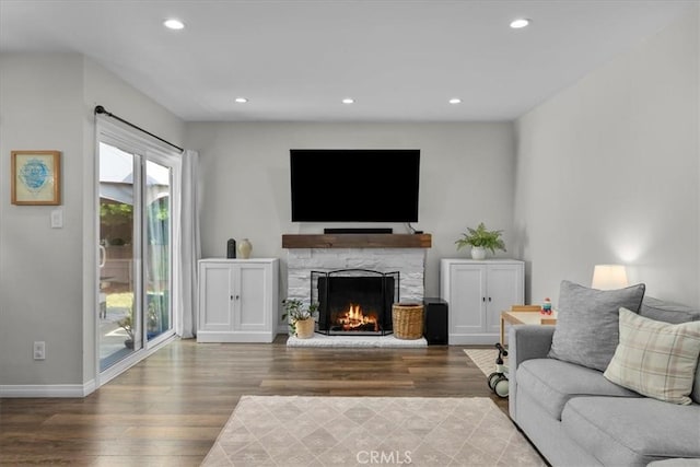 3821 W 183rd St, Torrance, CA 90504 - living area featuring wood finished floors, a stone fireplace, recessed lighting, and baseboards