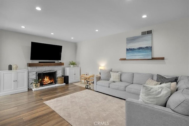 3821 W 183rd St, Torrance, CA 90504 - living area featuring wood finished floors, a fireplace, and recessed lighting