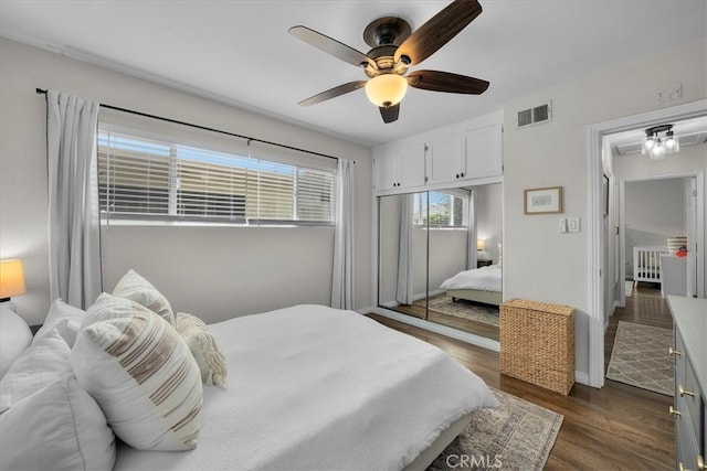 3821 W 183rd St, Torrance, CA 90504 - bedroom with dark wood-style floors, ceiling fan, baseboards, and a closet