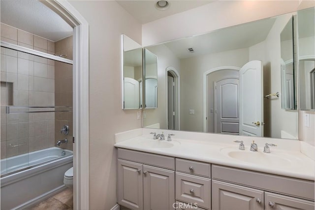 42442 Fiji Way, Temecula, CA 92592 - full bathroom featuring toilet, shower / bath combination with glass door, and double vanity