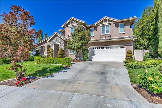 42442 Fiji Way, Temecula, CA 92592 - craftsman house with an attached garage, stucco siding, concrete driveway, and a tile roof