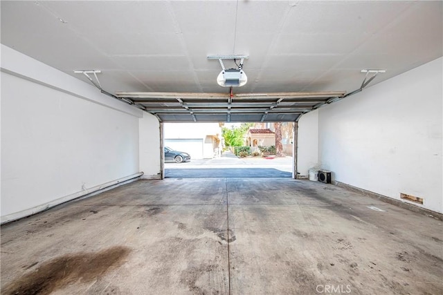 43473 30th St W Unit 4, Lancaster, CA 93536 - garage with a garage door opener