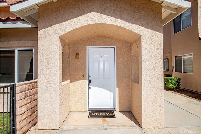 43473 30th St W Unit 4, Lancaster, CA 93536 - view of exterior entry with stucco siding
