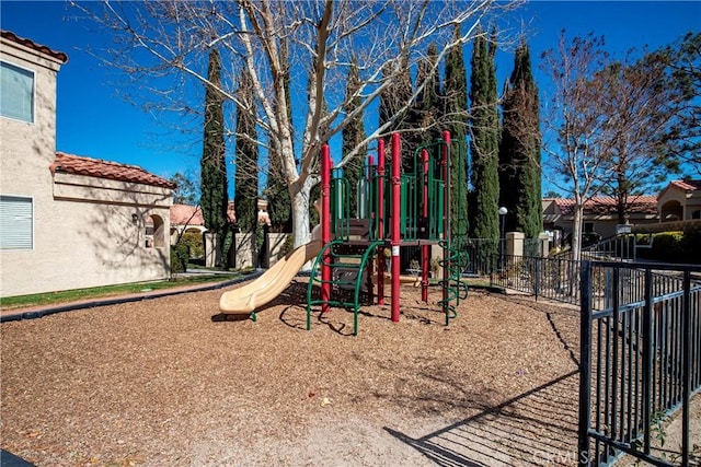 43473 30th St W Unit 4, Lancaster, CA 93536 - community play area featuring fence