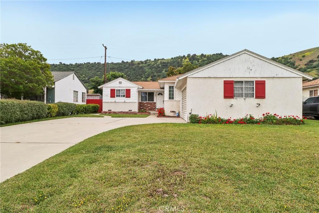 1862 Grier St, Pomona, CA 91766 - view of front of home with a front lawn