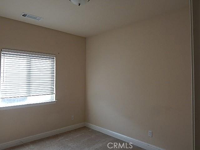 615 Vallecito Way, Red Bluff, CA 96080 - unfurnished room with light colored carpet and baseboards