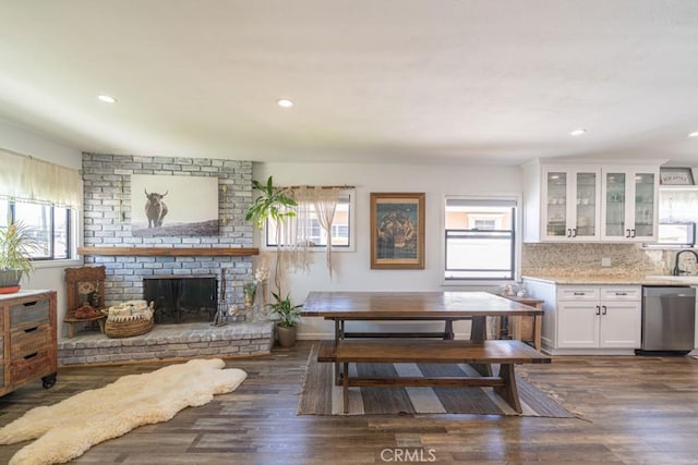 3717 W 182nd St, Torrance, CA 90504 - dining space featuring healthy amount of natural light, wood finished floors, a fireplace, and recessed lighting