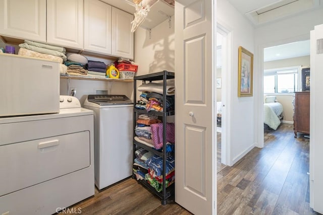 3717 W 182nd St, Torrance, CA 90504 - laundry room with cabinet space, washing machine and clothes dryer, and wood finished floors
