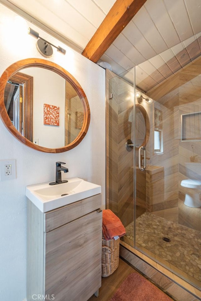 3717 W 182nd St, Torrance, CA 90504 - full bathroom with vanity, beam ceiling, a stall shower, and wood finished floors