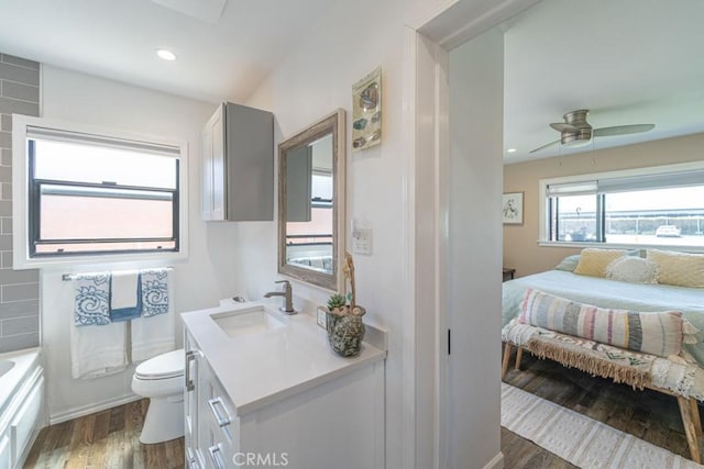3717 W 182nd St, Torrance, CA 90504 - ensuite bathroom with vanity, wood finished floors, a tub, ceiling fan, and recessed lighting