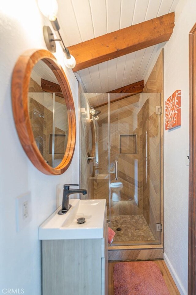 3717 W 182nd St, Torrance, CA 90504 - bathroom with vanity, beamed ceiling, wood finished floors, and a stall shower