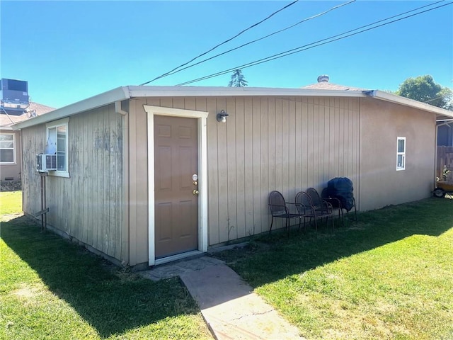 view of outbuilding featuring cooling unit