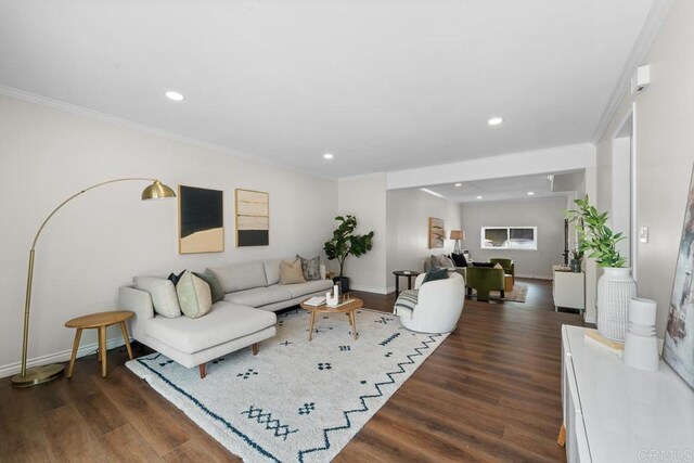 5426 Dwight St, San Diego, CA 92105 - living room featuring dark wood finished floors, recessed lighting, baseboards, and ornamental molding