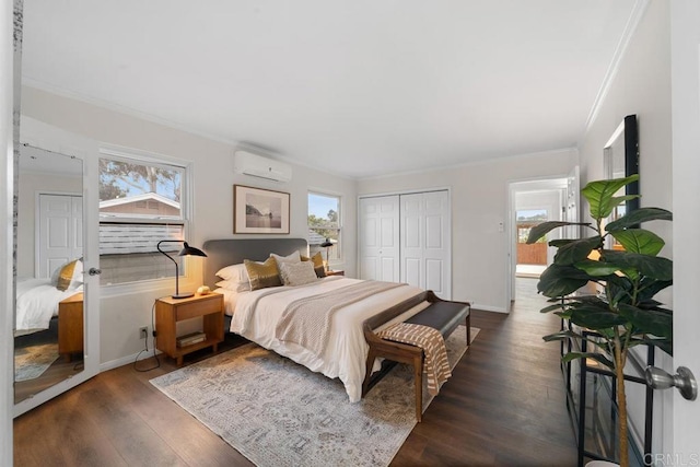 5426 Dwight St, San Diego, CA 92105 - bedroom featuring an AC wall unit, ornamental molding, multiple windows, and dark wood-style floors