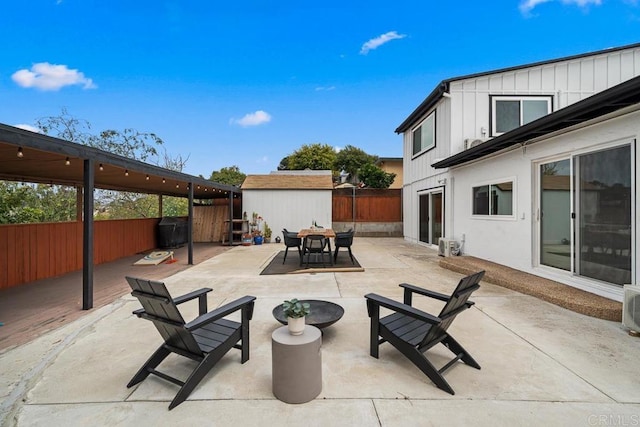 5426 Dwight St, San Diego, CA 92105 - fenced backyard featuring a shed, outdoor dining area, and a patio area
