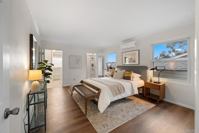 5426 Dwight St, San Diego, CA 92105 - bedroom featuring a wall unit AC, ornamental molding, and wood finished floors