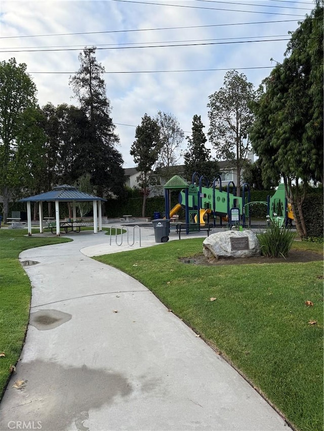 view of property's community with a gazebo and a lawn