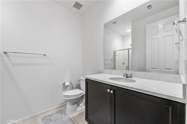 37732 Phelan Ln, Palmdale, CA 93552 - full bathroom with a stall shower, tile patterned floors, toilet, vanity, and baseboards