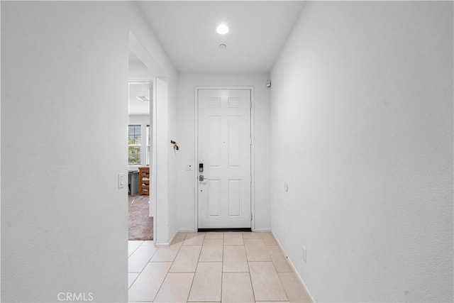 37732 Phelan Ln, Palmdale, CA 93552 - doorway to outside with baseboards and light tile patterned flooring