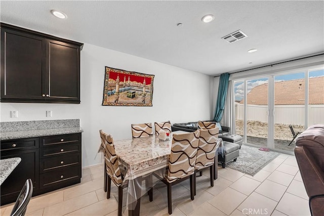 37732 Phelan Ln, Palmdale, CA 93552 - dining room featuring light tile patterned floors and recessed lighting