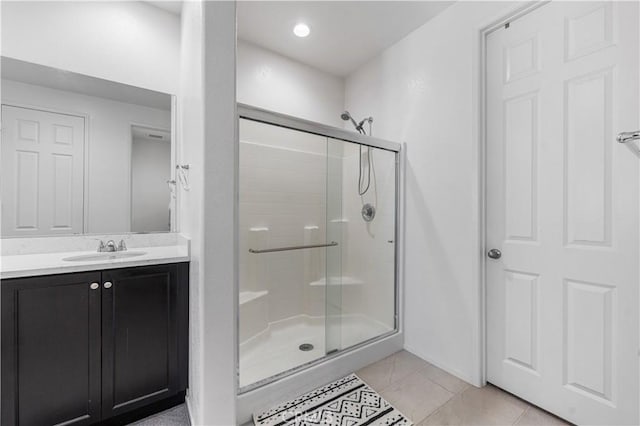 37732 Phelan Ln, Palmdale, CA 93552 - bathroom with a stall shower, vanity, and tile patterned flooring