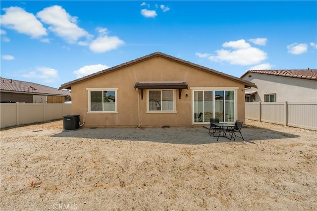 37732 Phelan Ln, Palmdale, CA 93552 - rear view of property with a fenced backyard, stucco siding, and central AC