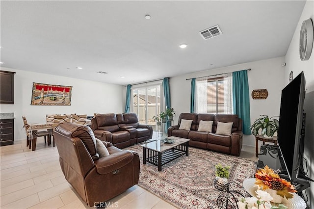 37732 Phelan Ln, Palmdale, CA 93552 - living area featuring recessed lighting, light tile patterned flooring, and baseboards