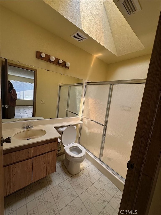 1102 Monroe St, Lake Elsinore, CA 92530 - full bath featuring a stall shower, vanity, and tile patterned floors